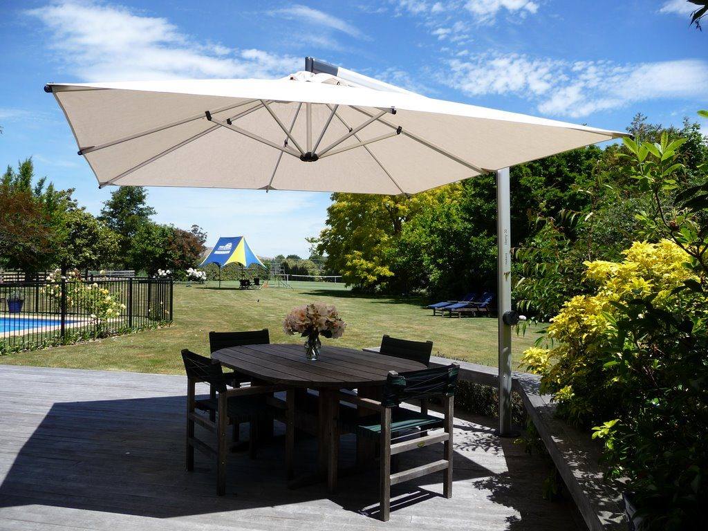Shade7 Outdoor Umbrella in residential garden patio NZ