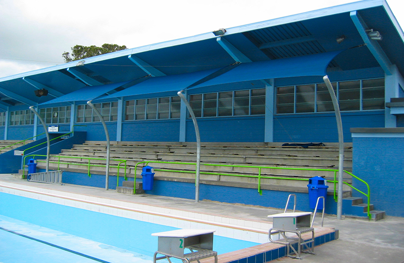 Shade sail in community pool area