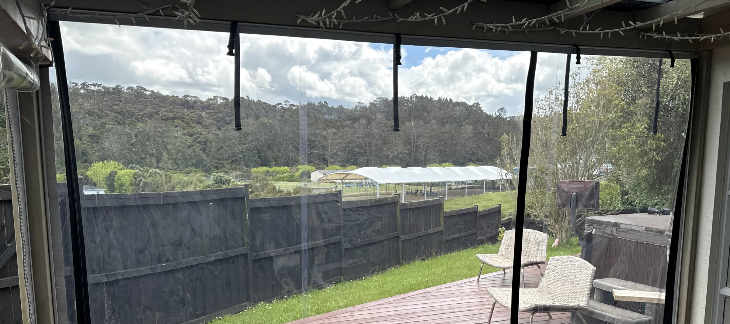 Manual roll-up clear PVC blinds by Sunshade NZ