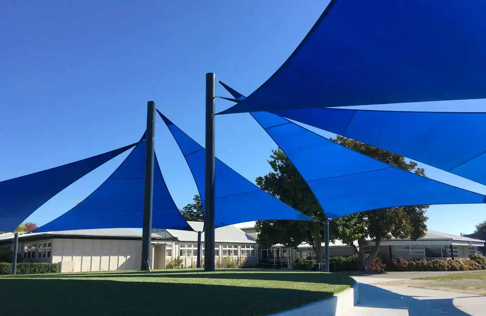 Secondary-Taradale-High-School Modern blue shade sail structures installed at Taradale High School for student sun protection and outdoor coverage