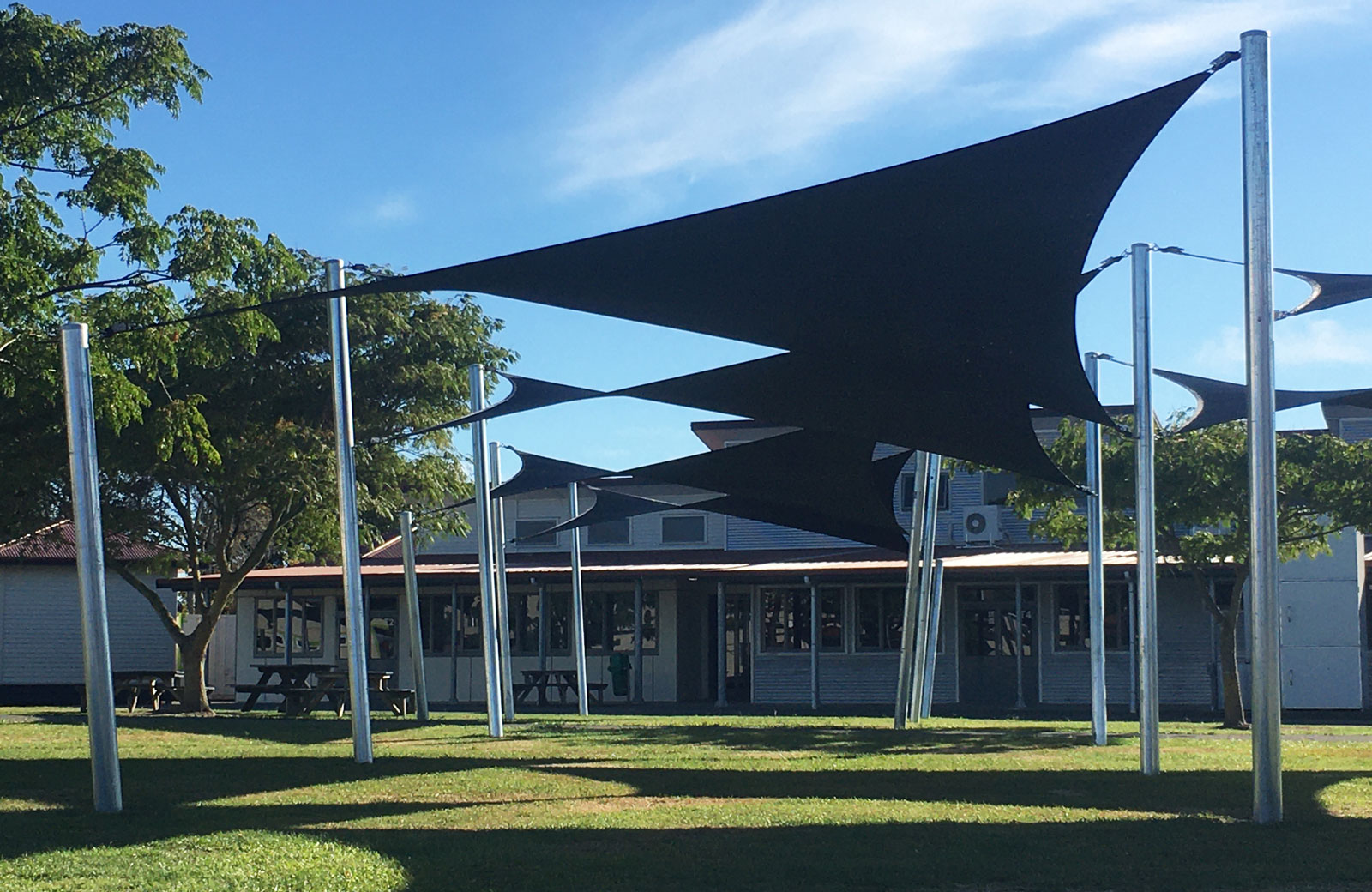 Stylish set of architectural shade sails at Wairoa College created by Sunshade Hawkes Bay