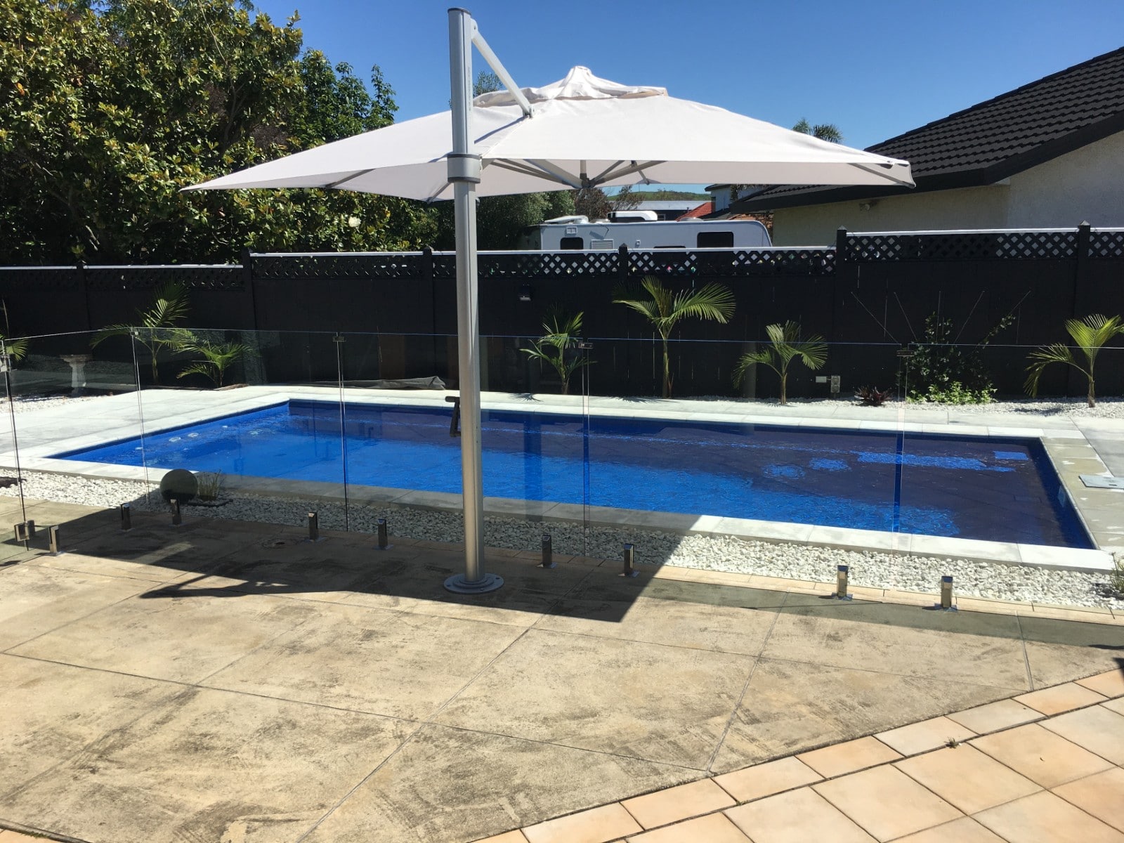 First Shade7 Outdoor Umbrella installed for poolside haven in Hawkes Bay