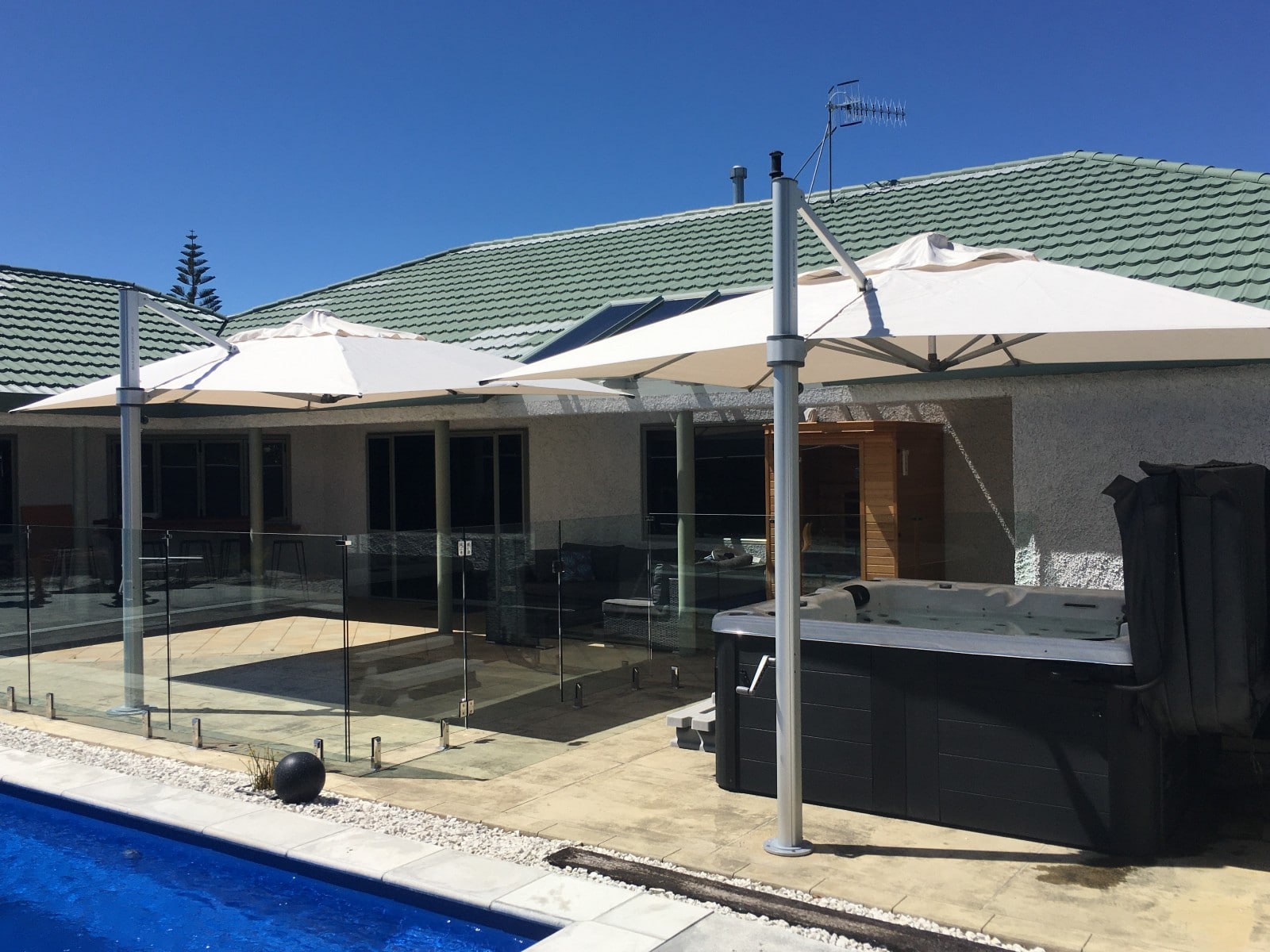 Shade7 outdoor umbrella provides shade for poolside haven in Hawkes Bay